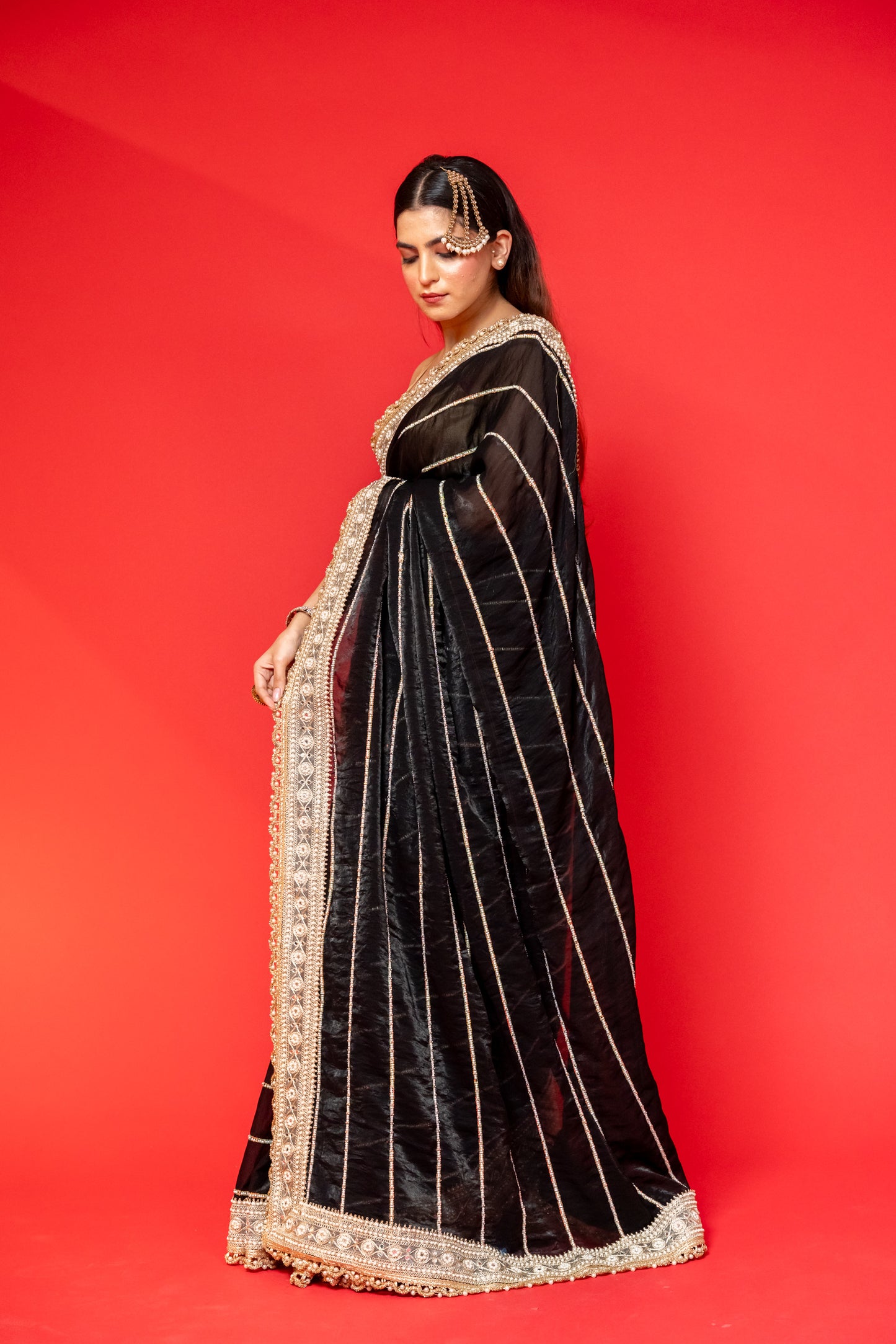 Midnight Black Tissue Silk Saree with Intricate Golden Embroidery