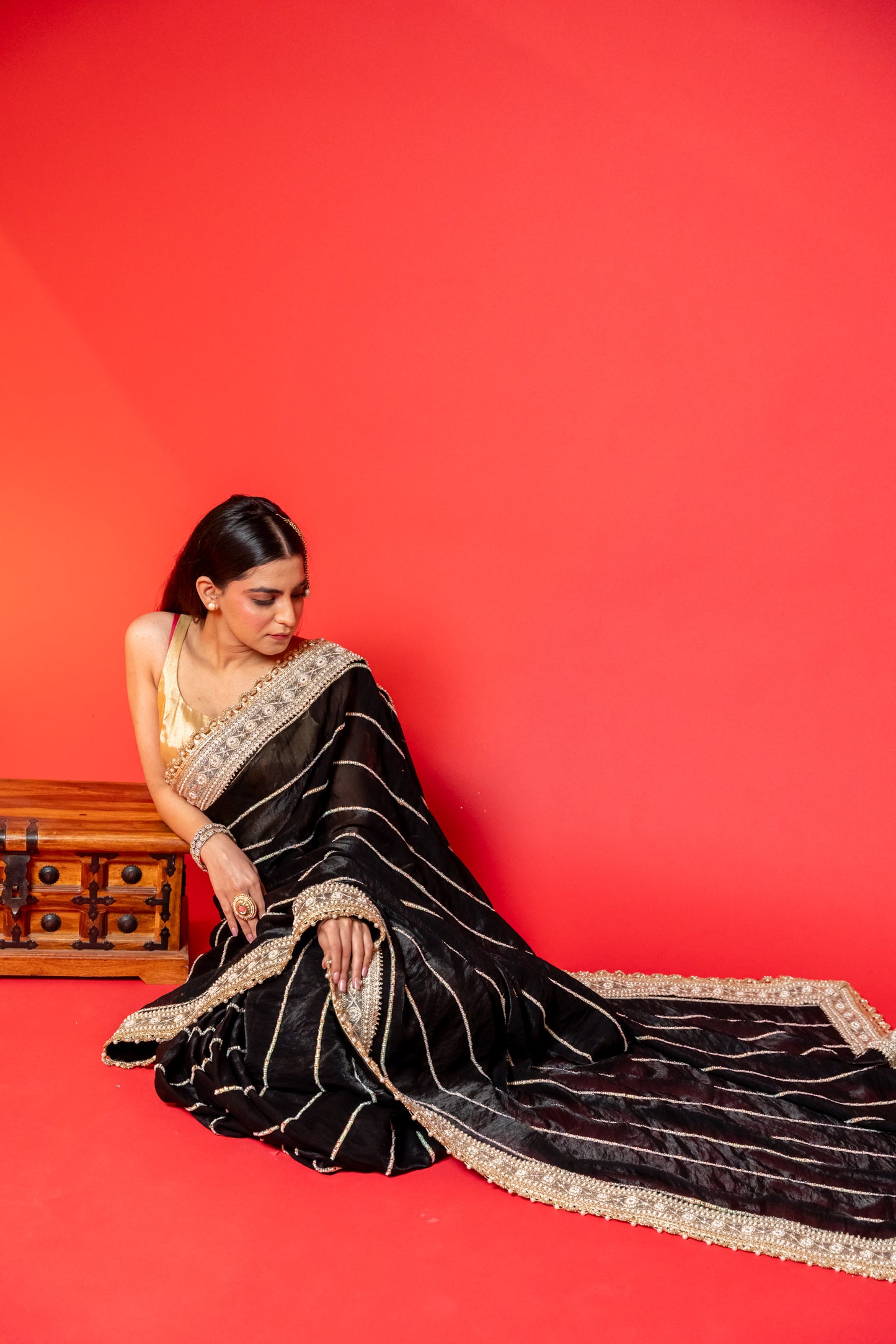Midnight Black Tissue Silk Saree with Intricate Golden Embroidery
