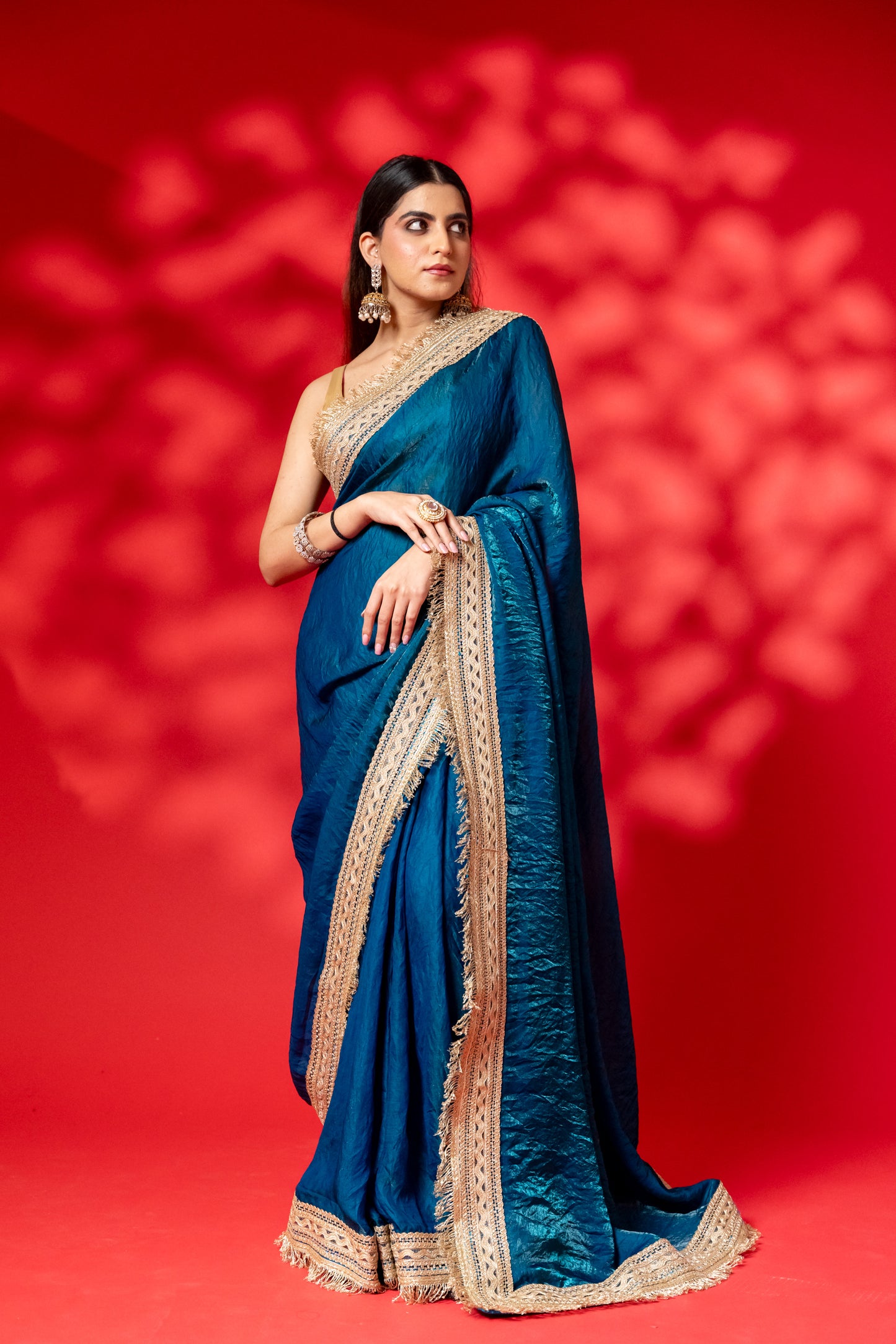 Deep Teal Raw Silk Saree with Antique Gold Border