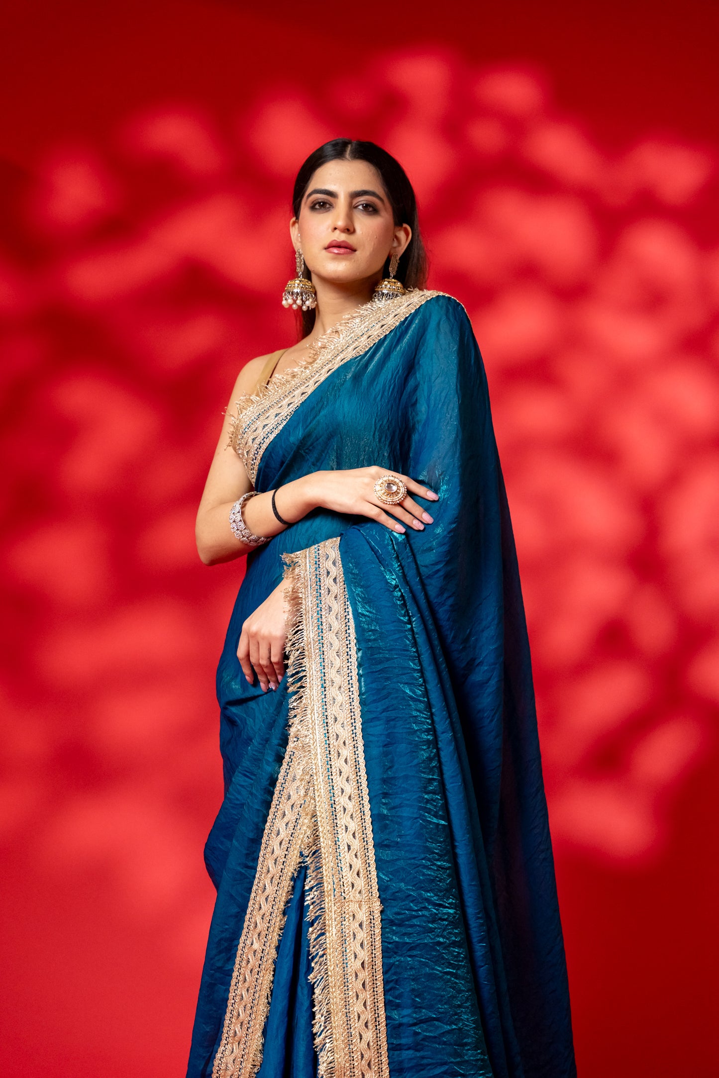Deep Teal Raw Silk Saree with Antique Gold Border