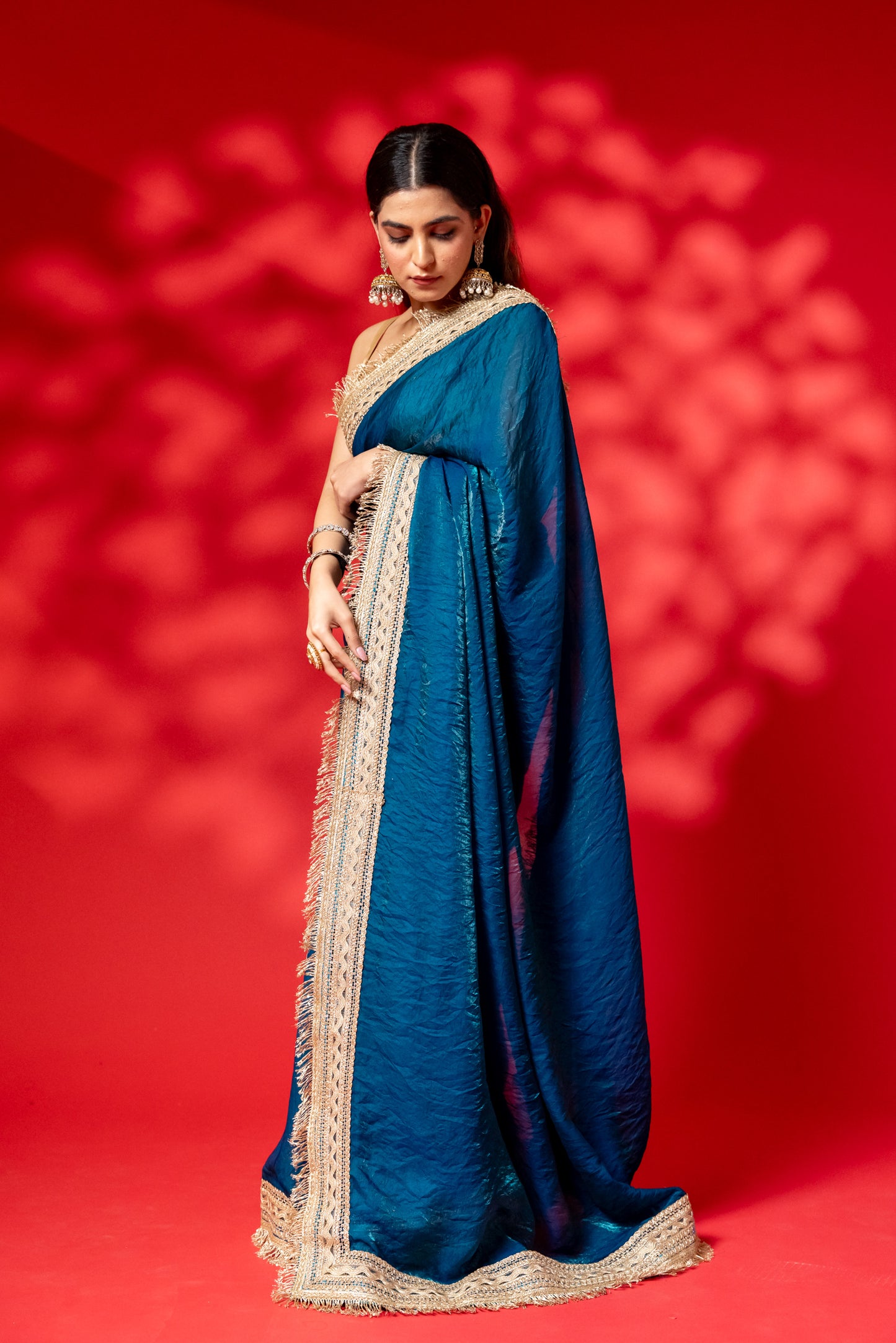 Deep Teal Raw Silk Saree with Antique Gold Border
