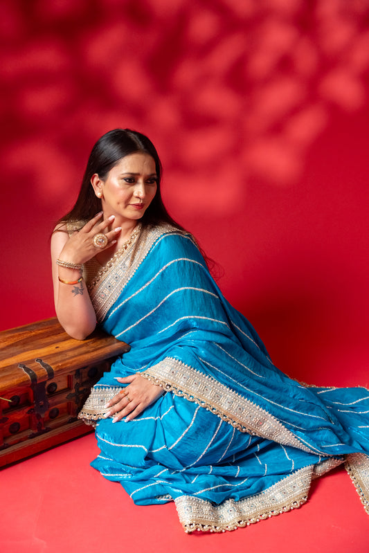 Turquoise Blue Striped Silk Saree with Heavy Embellished Border