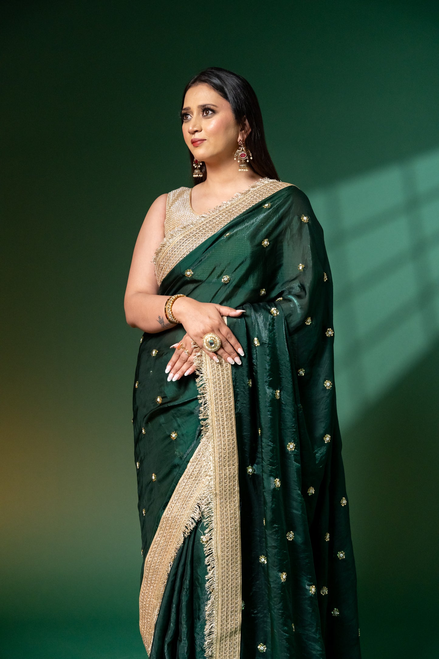 Emerald Green Hand-Embroidered Saree with Zari Fringe Border