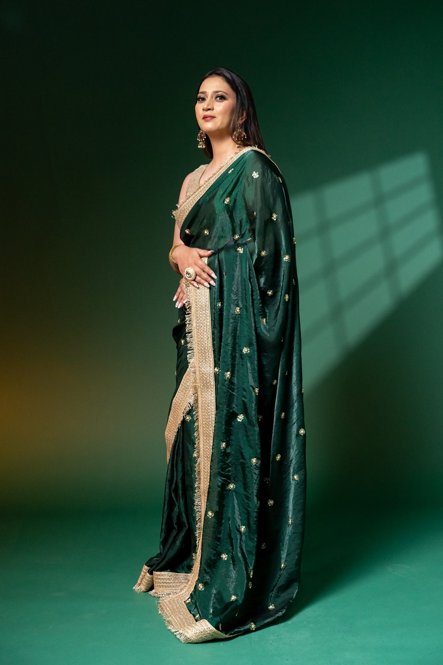 Emerald Green Hand-Embroidered Saree with Zari Fringe Border