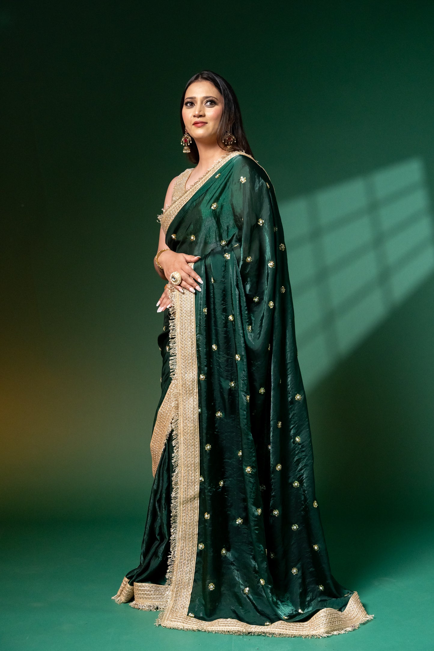 Emerald Green Hand-Embroidered Saree with Zari Fringe Border